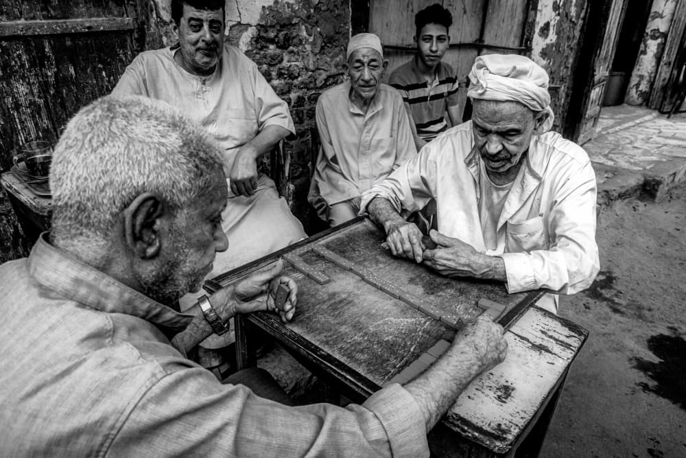 Men Playing Game by Hisham Aboelnaga — canvas wall art