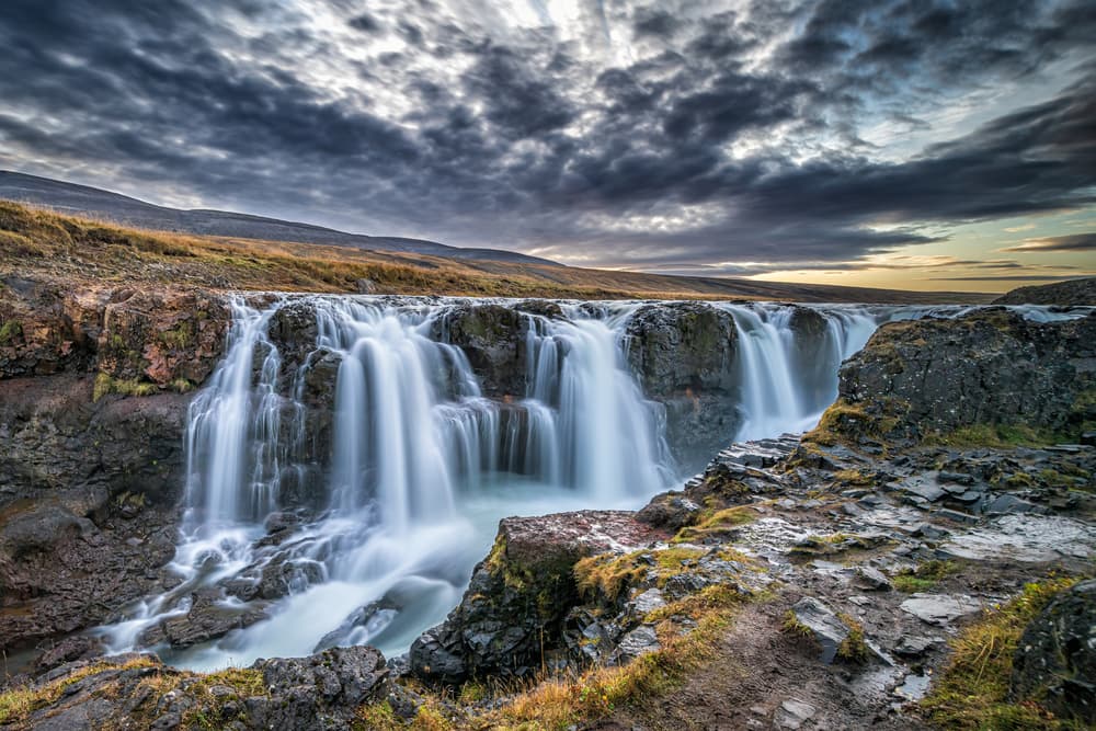 Serene Waterfall Flow by Jeffrey C. Sink — canvas wall art