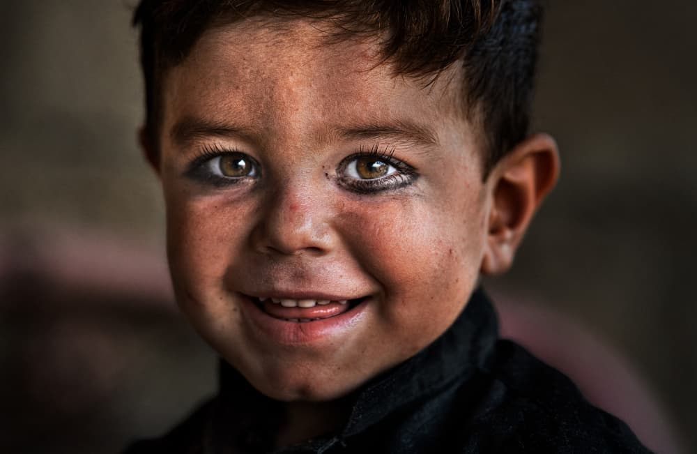 Smiling Soulful Boy by Joxe Inazio Kuesta Garmendia — canvas wall art