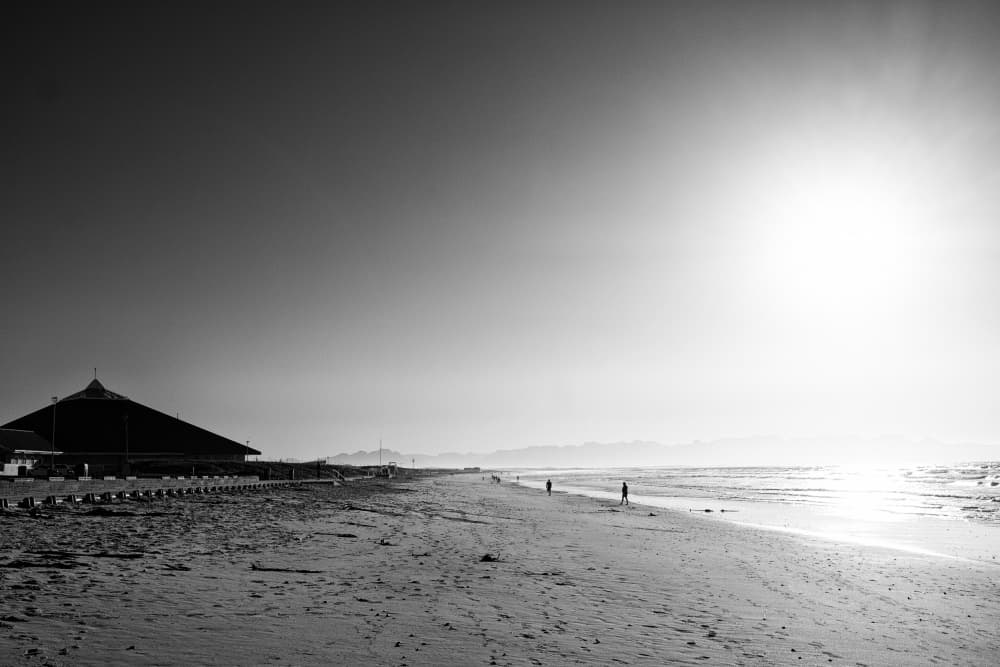 Sunlit Ocean Shore by Dan Edwards — canvas wall art