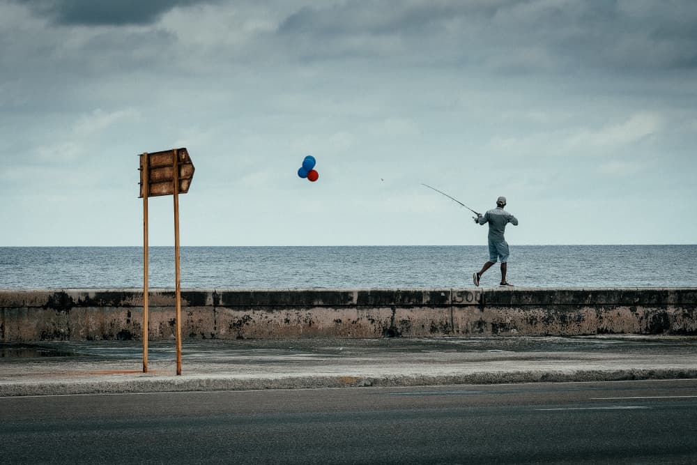 Seaside Fisherman with Balloons by Andy Bauer — canvas wall art