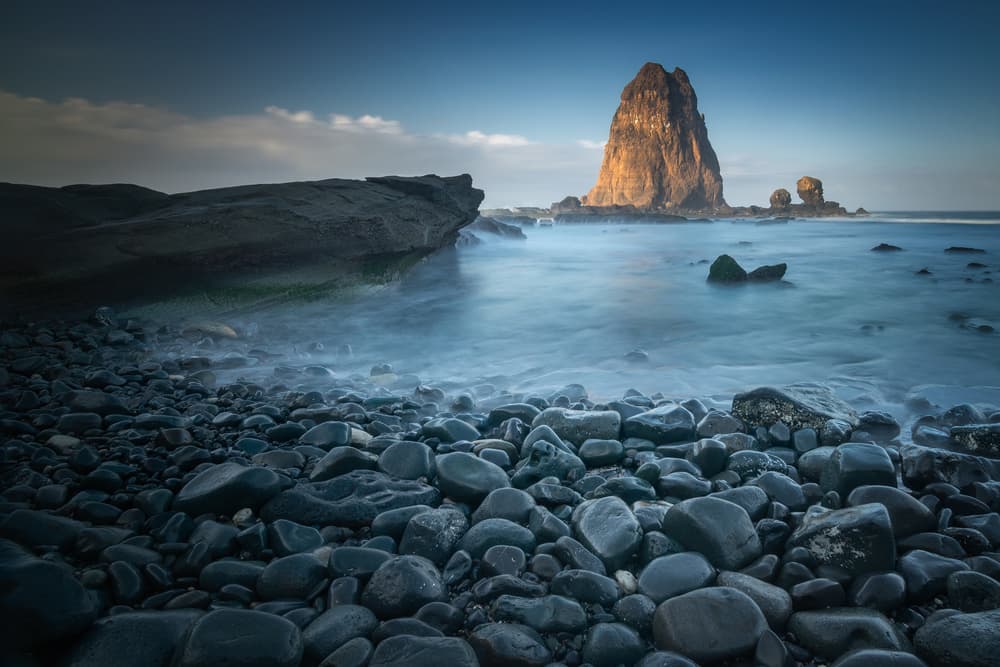 Majestic Sea Stack Sunset by Prasad Malgaonkar — canvas wall art