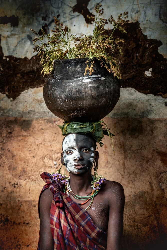 African Face Paint Portrait by Trevor Cole — canvas wall art