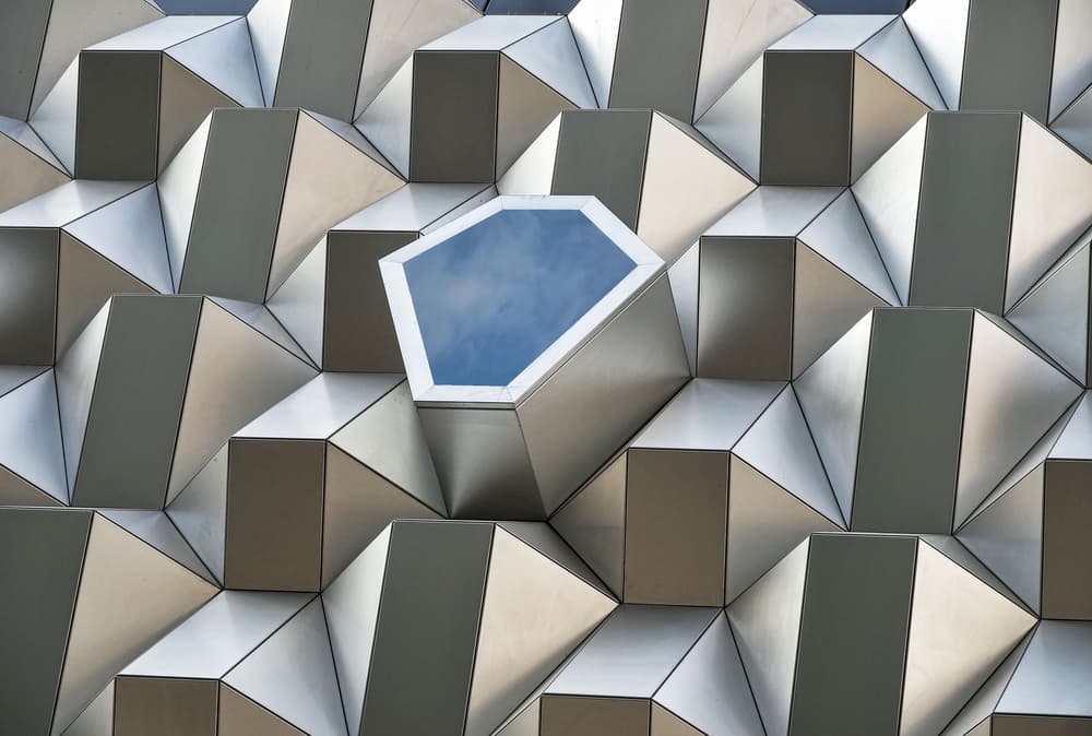 Hexagonal Facade Reflection by Renate Reichert — canvas wall art