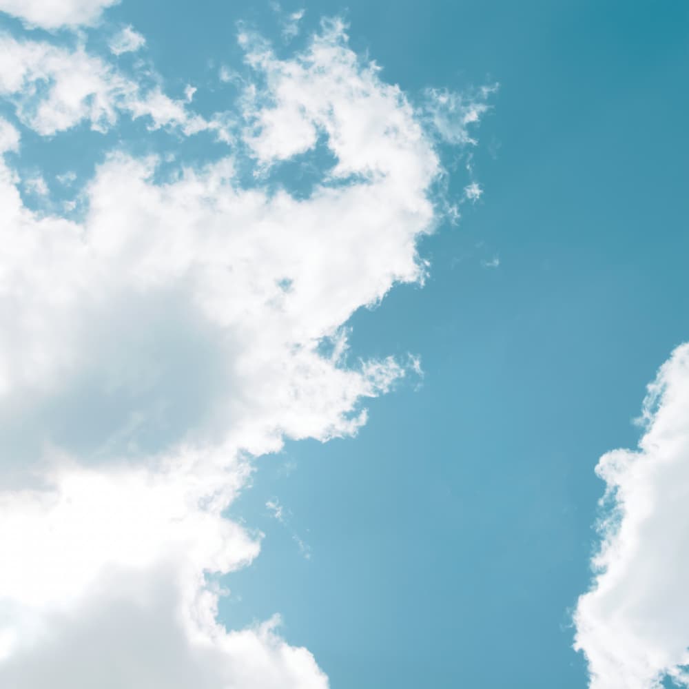 Fluffy Clouds Blue Sky by Stephanie Klatt — canvas wall art