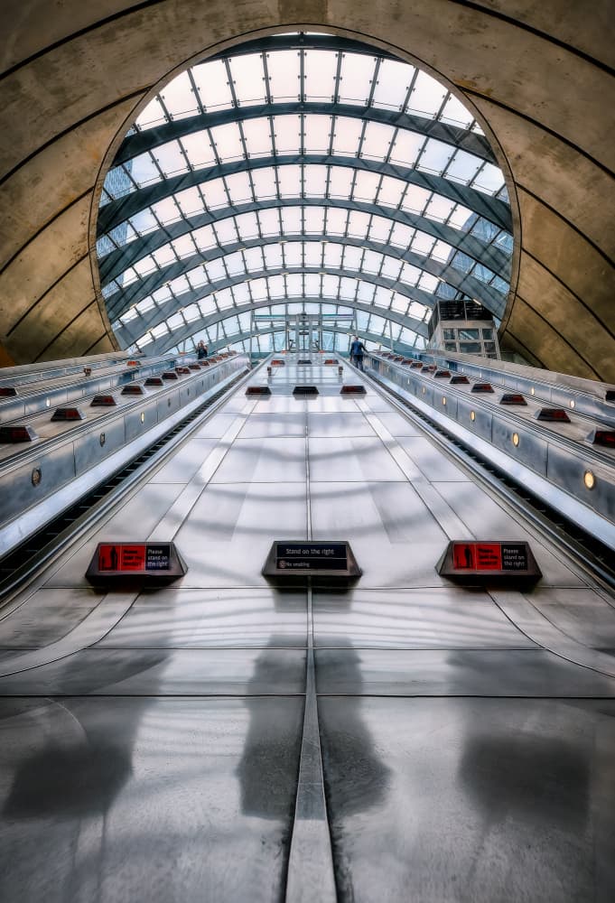 Futuristic Escalator Hall by Juan Luis Seco — canvas wall art