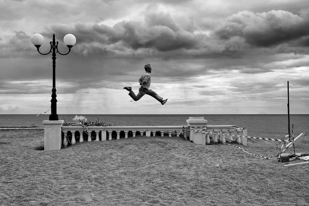 Dramatic Coastal Leap by Carlo Ferrara — canvas wall art