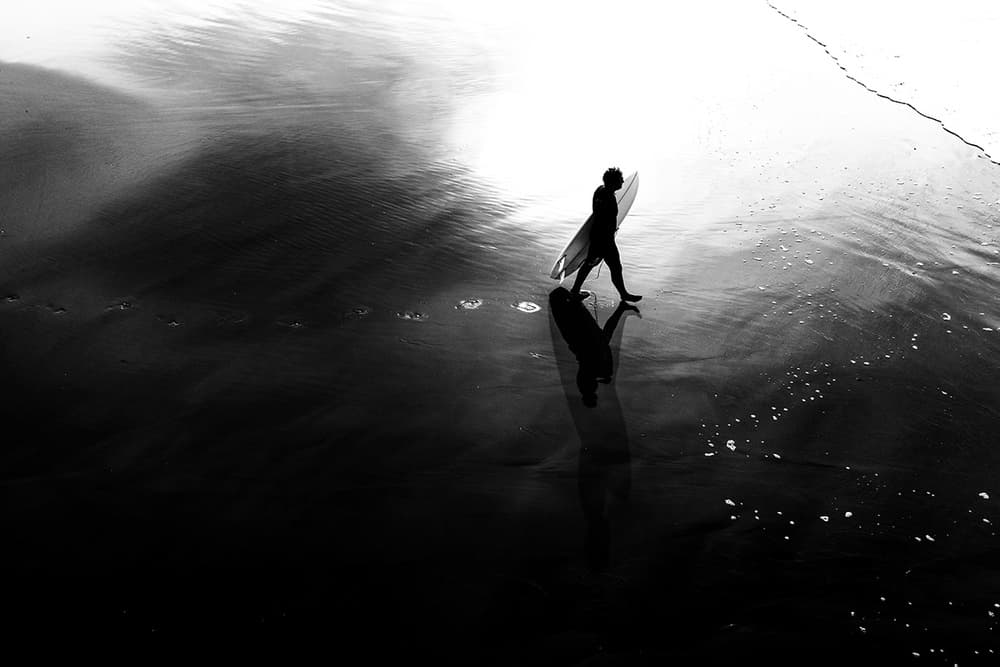 Coastal Surfer Silhouette by Massimo Della Latta — canvas wall art