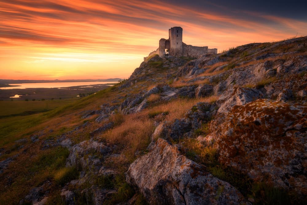 Golden Sunset Castle Ruins by Ionut Petrea — canvas wall art