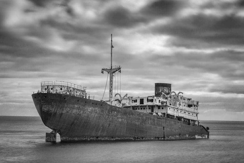 Rusty Shipwreck at Sea by Andy Bauer — canvas wall art