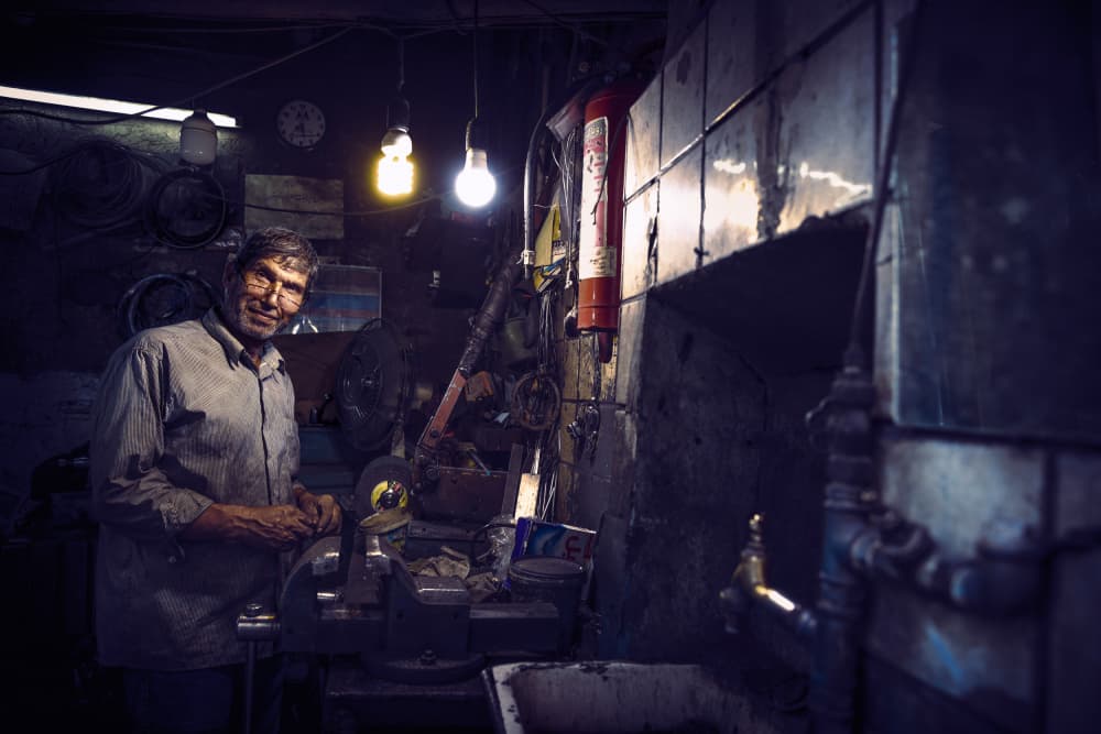 Smiling Craftsman's Workshop by Marco Tagliarino — canvas wall art