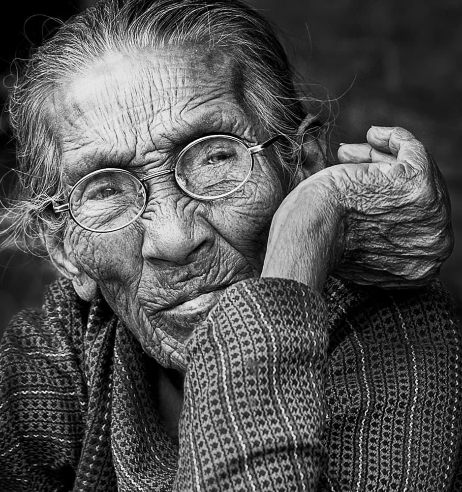 Thoughtful Elderly Face by Angela Muliani Hartojo — canvas wall art