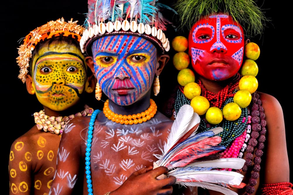 Painted Tribal Faces by Avishek Das — canvas wall art