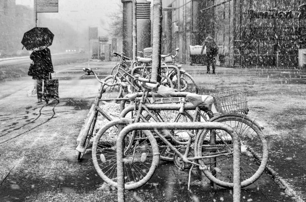 Snowy City Bikes by Hans Günther — canvas wall art