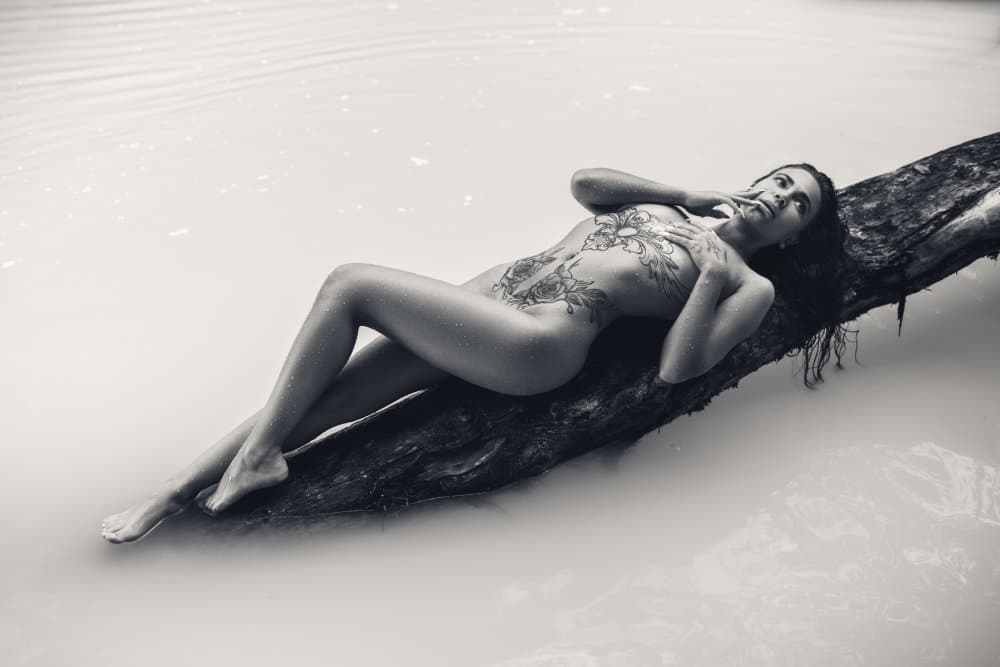 Tattooed Woman Serene Water by Rostovskiy Anton — canvas wall art