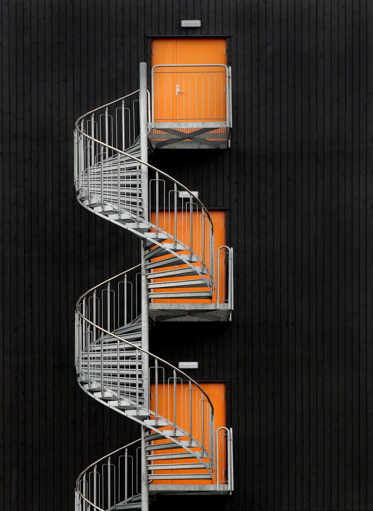Orange Spiral Staircase by Hans-Wolfgang Hawerkamp — canvas wall art