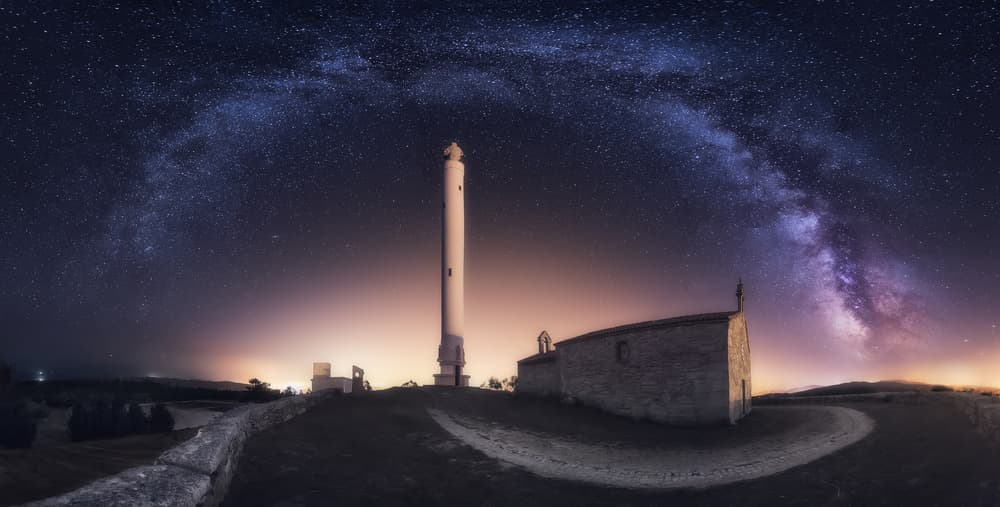 Milky Way Over Lighthouse Chapel by Carlos F. Turienzo — canvas wall art