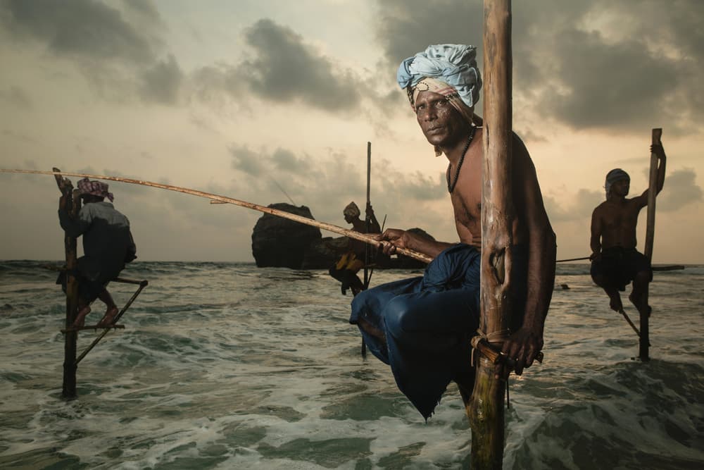 Sri Lankan Stilt Fishermen by Giacomo Bruno — canvas wall art