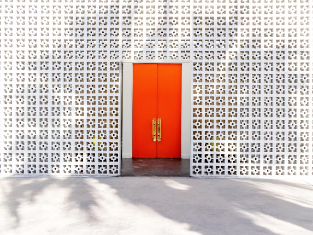 Parker Orange Doors and Breezeblock Wall by Tom Windeknecht — canvas wall art