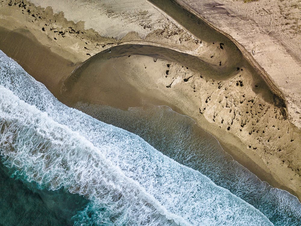 Ocean Meets Estuary by Rob Darby — canvas wall art