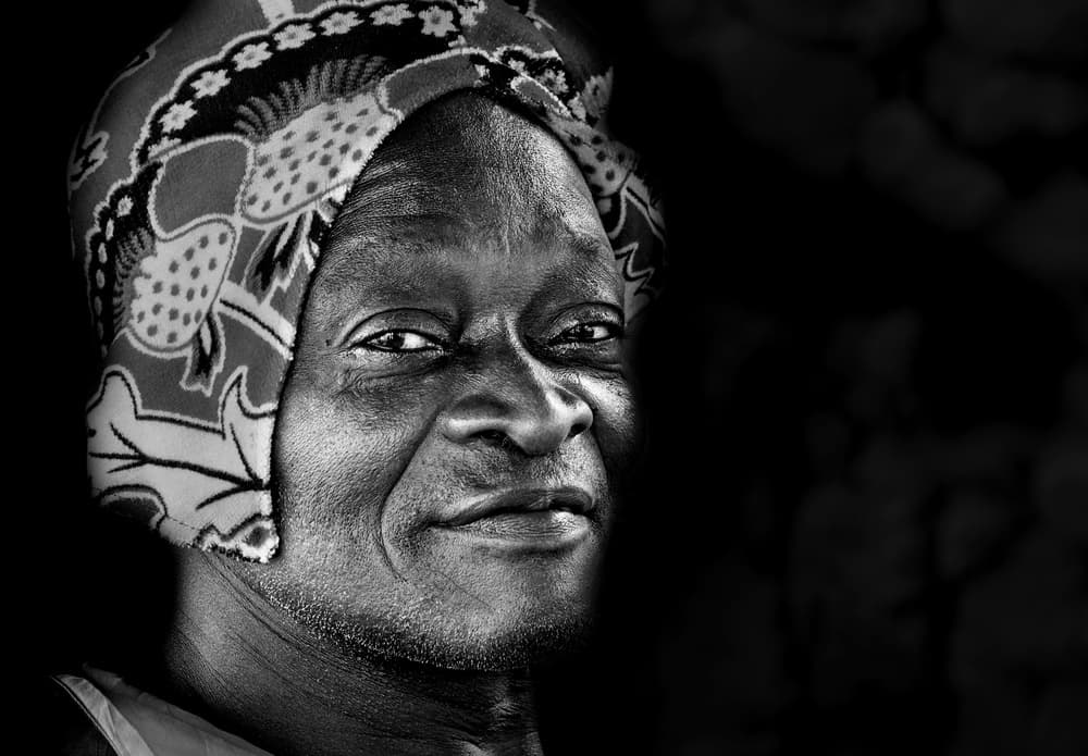 Contemplative African Woman by Elena Molina — canvas wall art