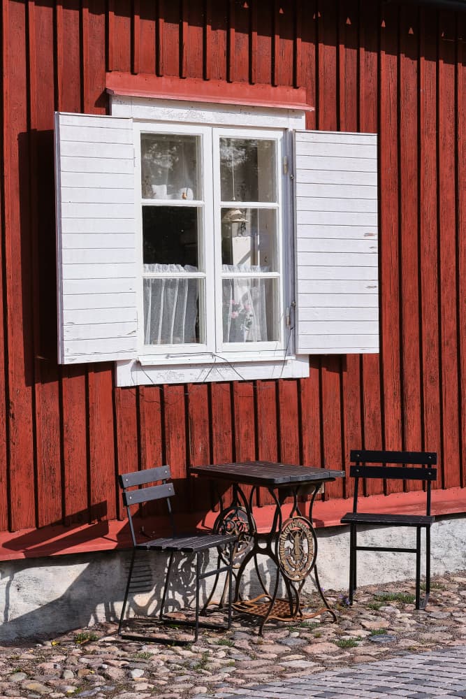 Red House Outdoor Seating by Geertjan Plooijer — canvas wall art