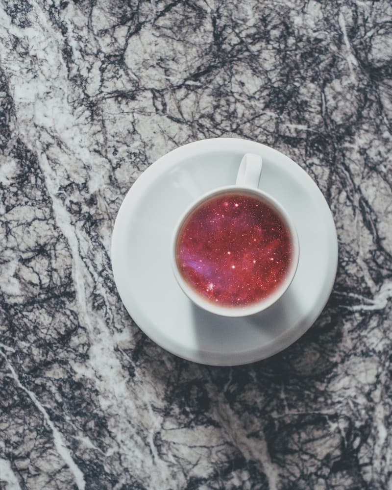 Galaxy Cup on Marble by Emiliano Deificus — canvas wall art