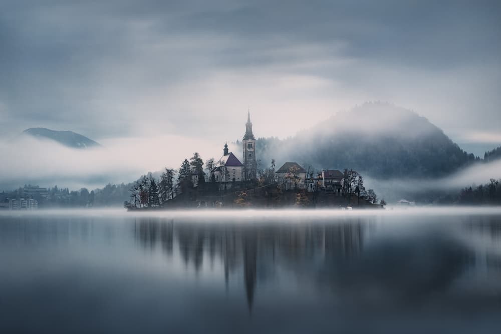Misty Lake Bled Island by Dmitry Kupratsevich — canvas wall art