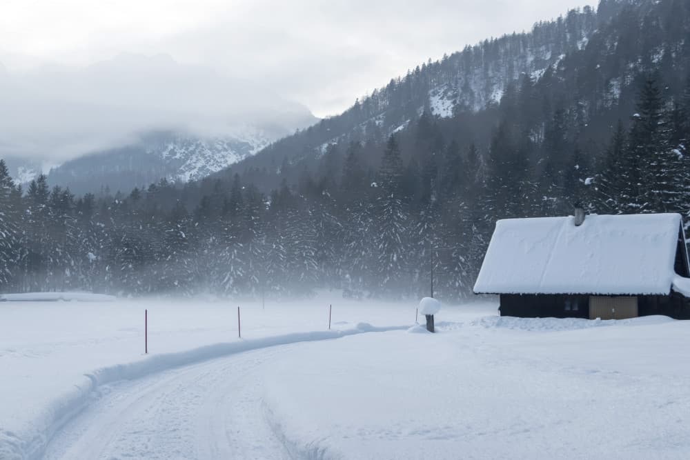 Peaceful Snowy Mountain Cabin by Emanuela Sol — canvas wall art