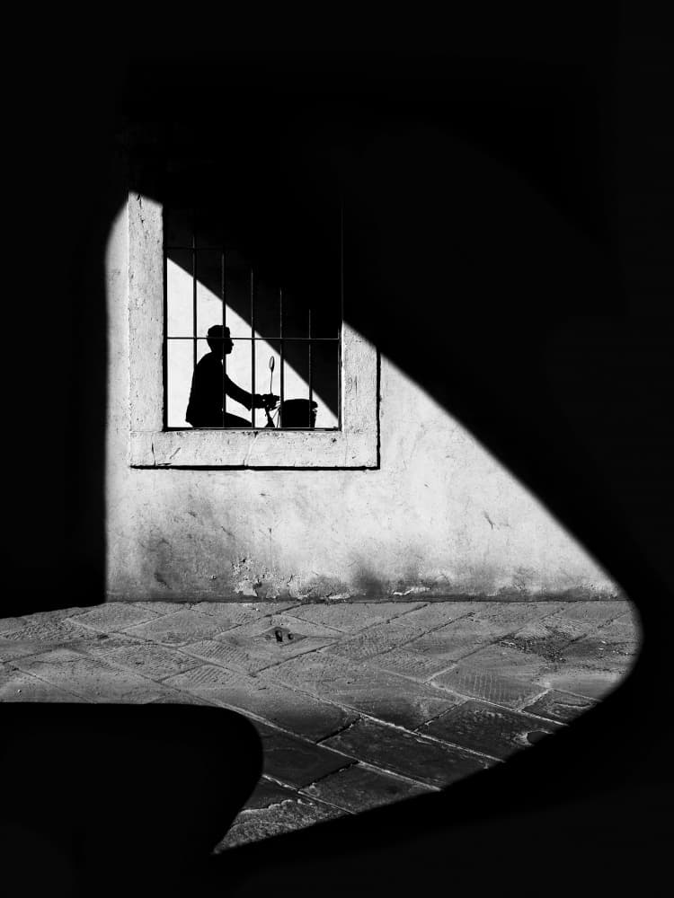 Window Worker Silhouette by Massimo Della Latta — canvas wall art