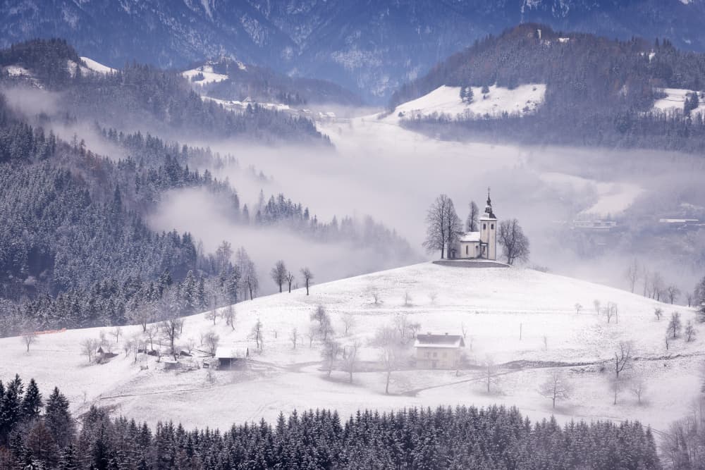 Church on Snowy Hill by Dan Mirica — canvas wall art