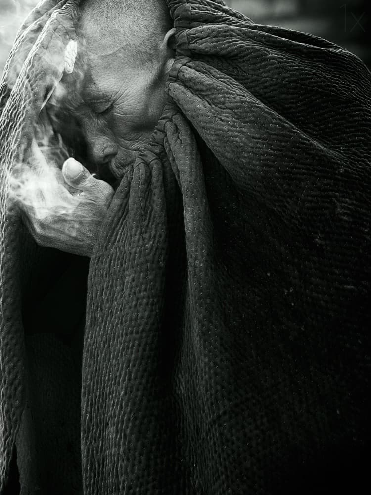 Pensive Elder With Smoke by Shu-Guang Yang — canvas wall art