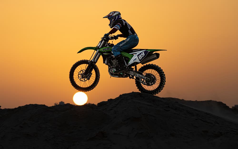 Motocross Sunset Jump by Hamza Qarooni — canvas wall art