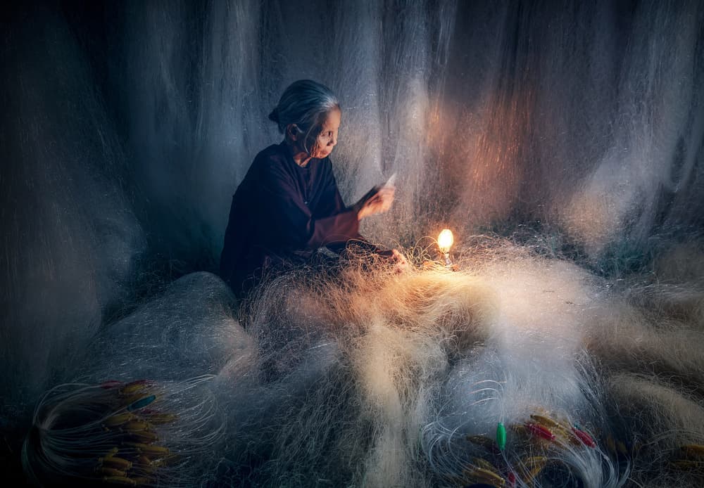 Quiet Night Mending Nets by Nguyen Tan Tuan — canvas wall art