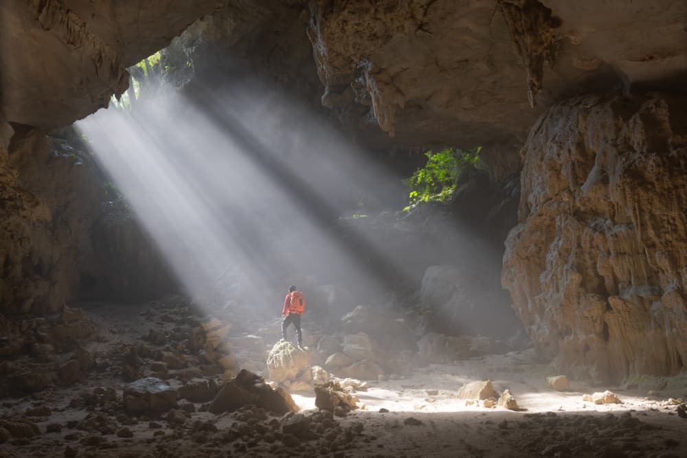 Cave Light Explorer by Simoon — canvas wall art