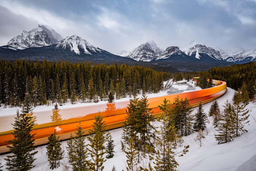 Snowy Mountain Train Trails by Li Ying — canvas wall art