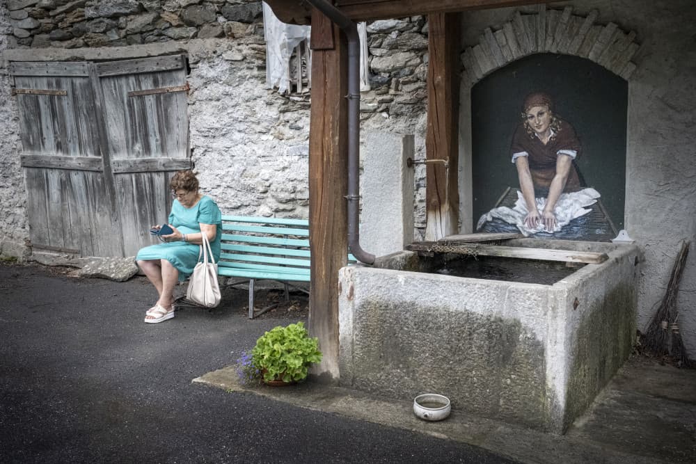 Woman In Rustic Village by Giorgio Toniolo — canvas wall art