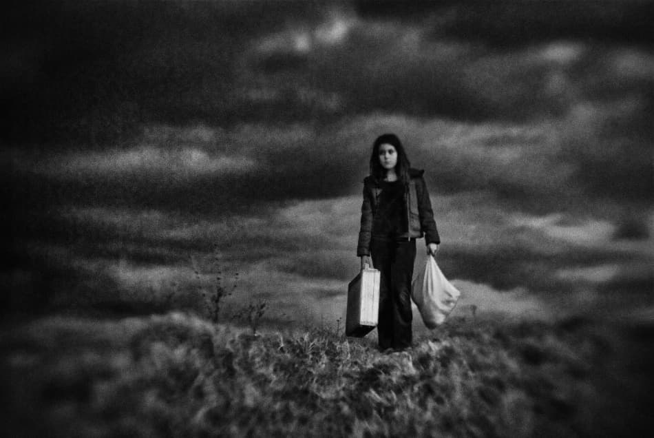 Girl Under Dark Clouds by Codrin Lupei — canvas wall art