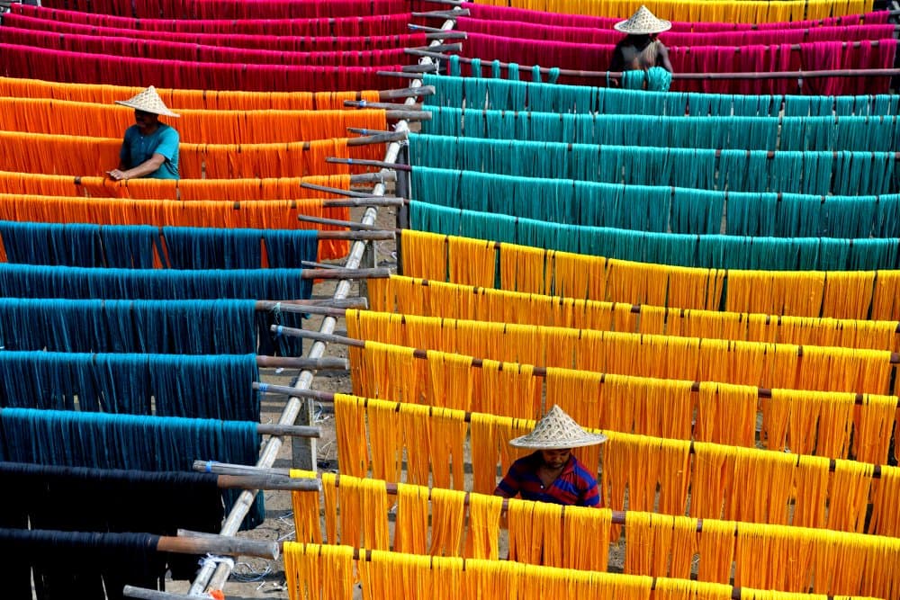 Vibrant Yarn Drying by Shaibal Nandi — canvas wall art