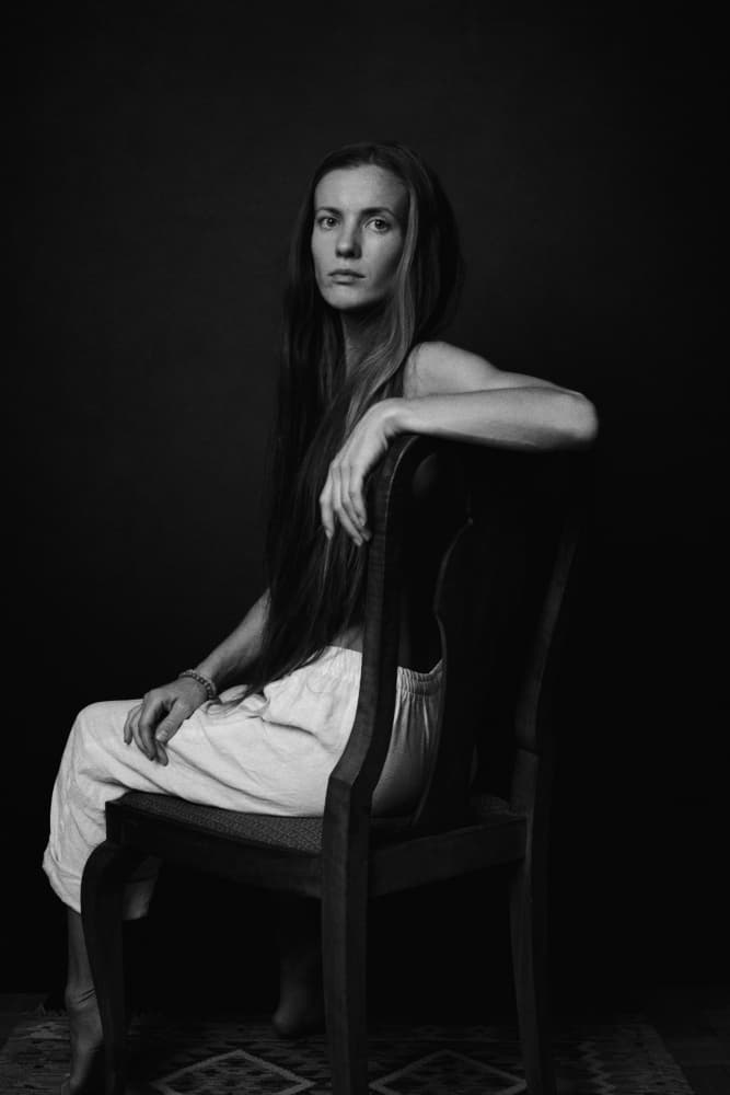 Seated Woman's Gaze by Steffen Lauterbach — canvas wall art