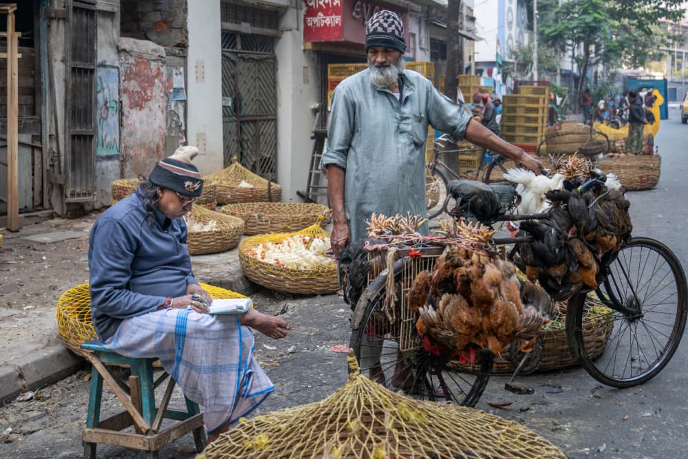 Indian Street Market Vendors by Ilana Lam — canvas wall art