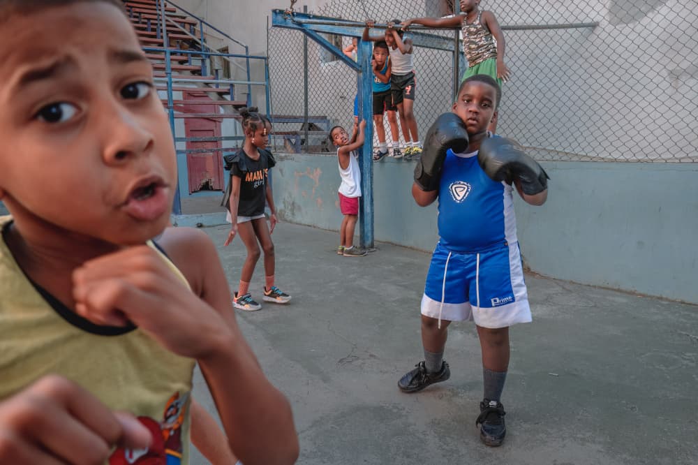 Young Boxers Play by MIN LI — canvas wall art