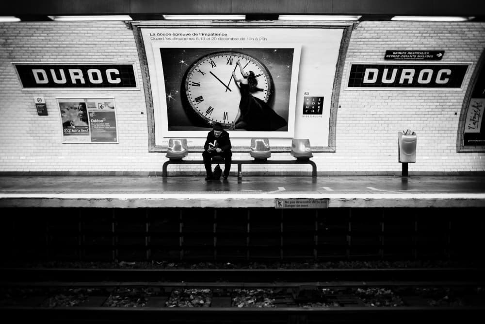 Solitary Subway Wait by Hervé Loire — canvas wall art