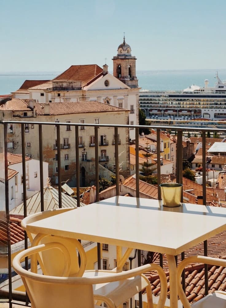 Outdoor Cafe City View by Del Mundo Imagery — canvas wall art