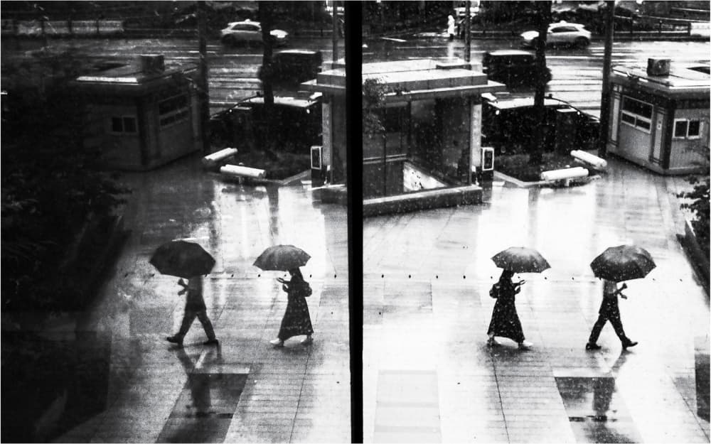 Umbrellas in the Rain by Parole Kim — canvas wall art