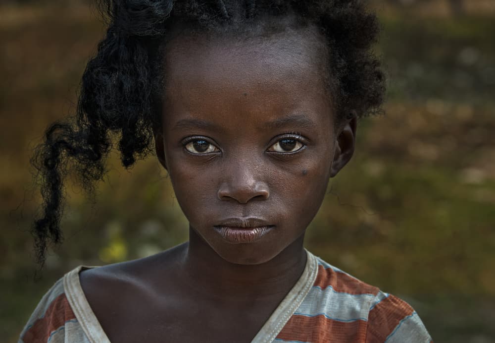 Young Girl's Direct Gaze by Joxe Inazio Kuesta Garmendia — canvas wall art