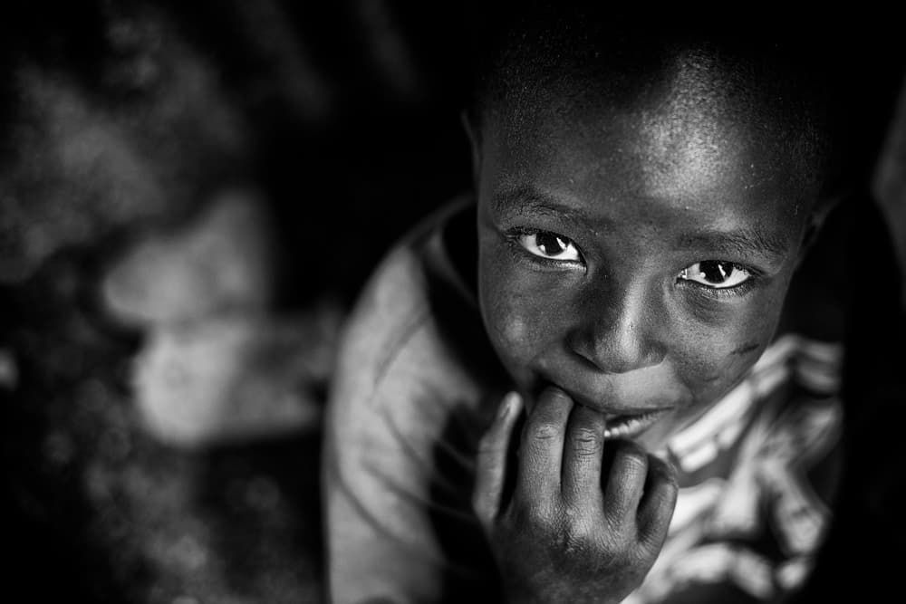 Thoughtful Young Boy Portrait by Goran Jovic — canvas wall art