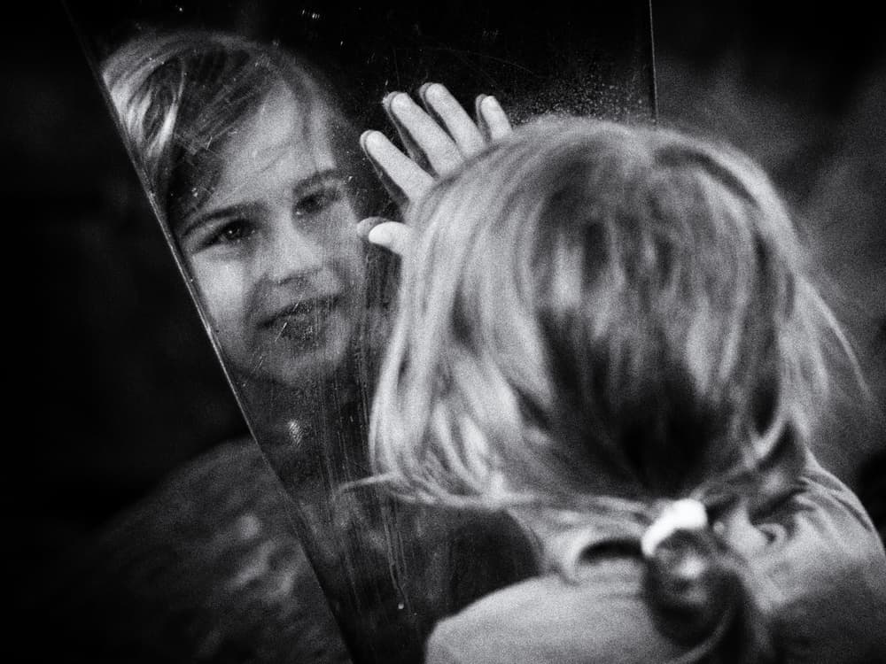 Smiling Girl Mirror by Thomas Siegel — canvas wall art