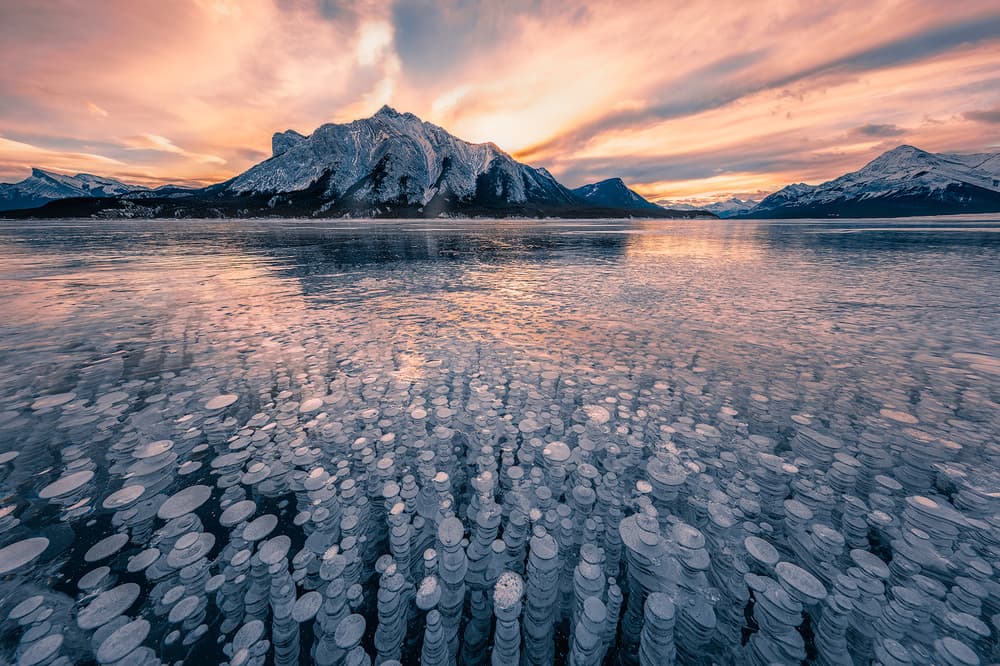 Frozen Bubble Lake Sunset by Yimei Sun — canvas wall art