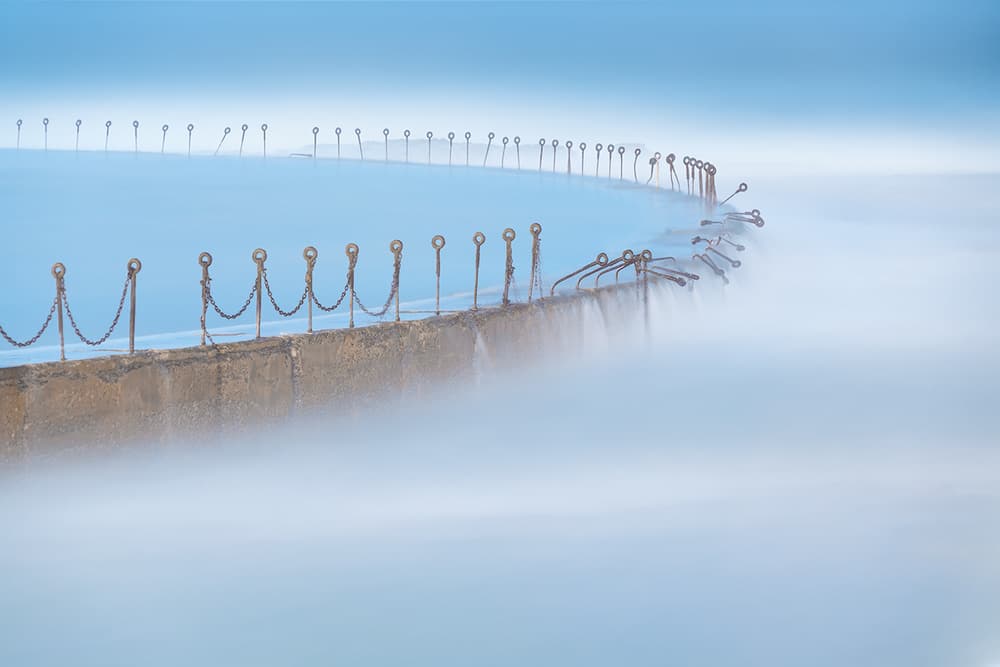 Misty Ocean Pool Curve by Jingshu Zhu — canvas wall art